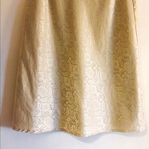 Brocade A-Line midi skirt in light gold and a beautiful sheen.